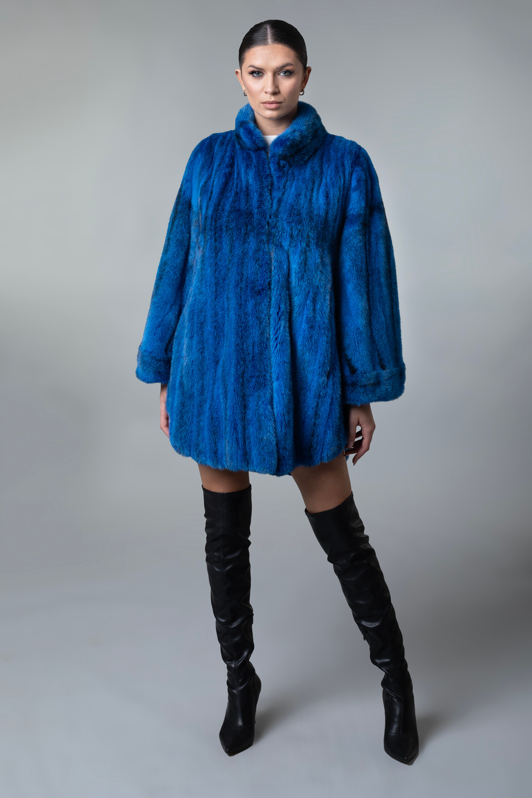 Electric Blue Mink Fur Coat Fully Let out Side Notches on model front view