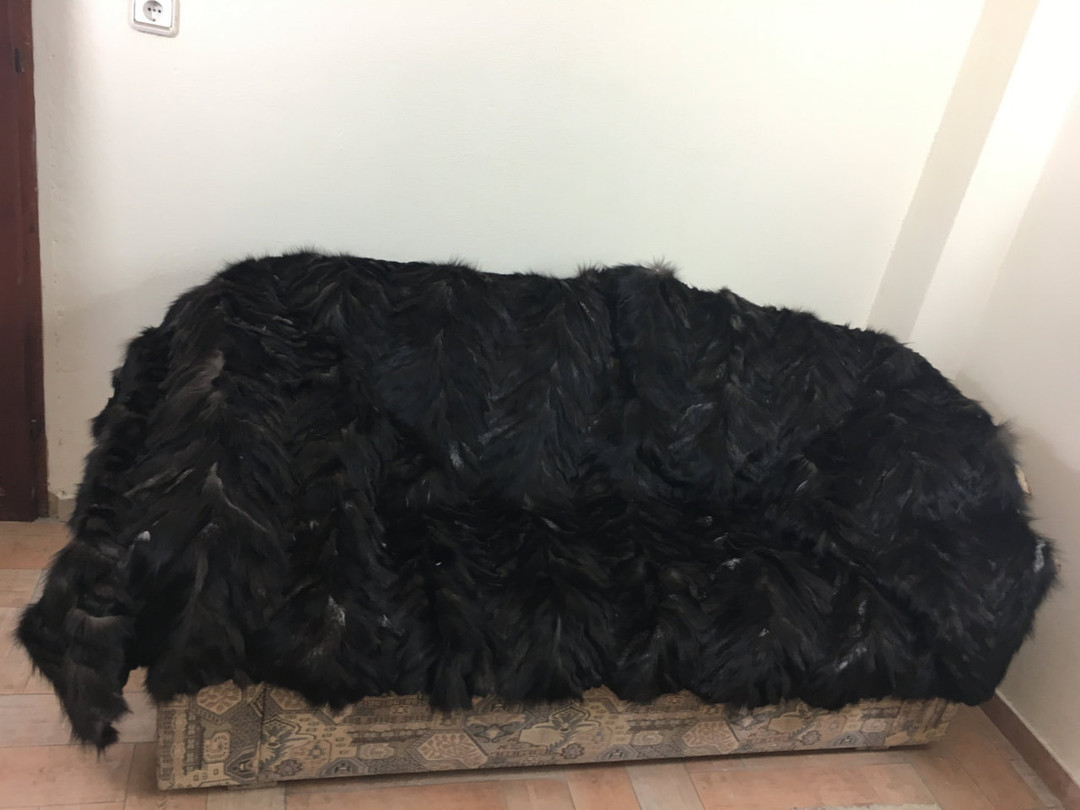 Black silver fox fur blanket sectional paws