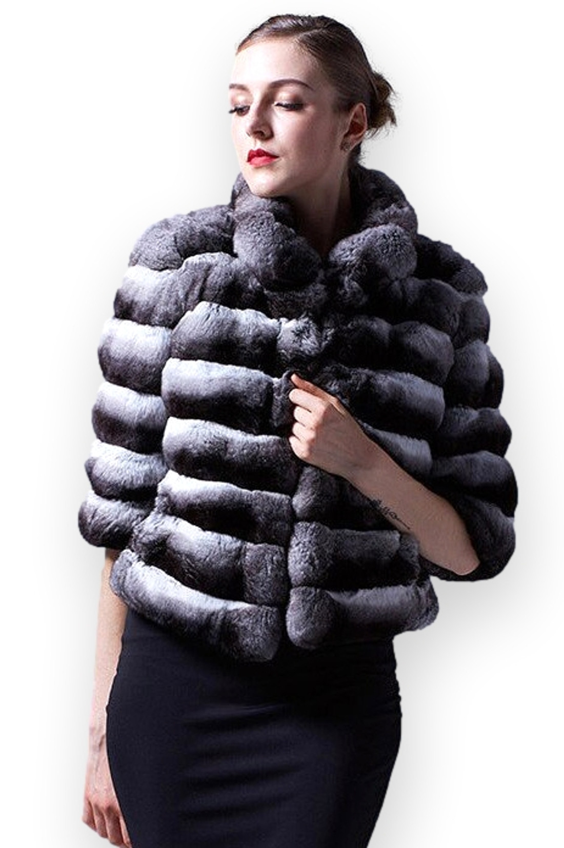 Short chinchilla jacket with elbow cut sleeves on model with french twist and black tight dres