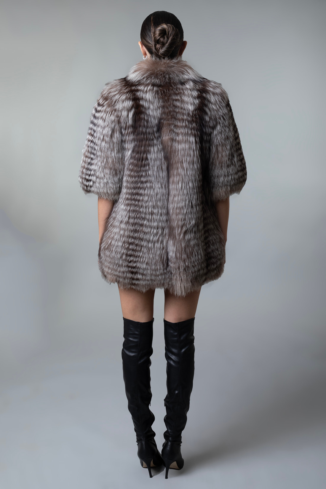 Silver Fox Fur Jacket Cropped Sleeves Feathered  on model  rear view Silver Fox Fur Jacket Cropped Sleeves Feathered  on model  rear view