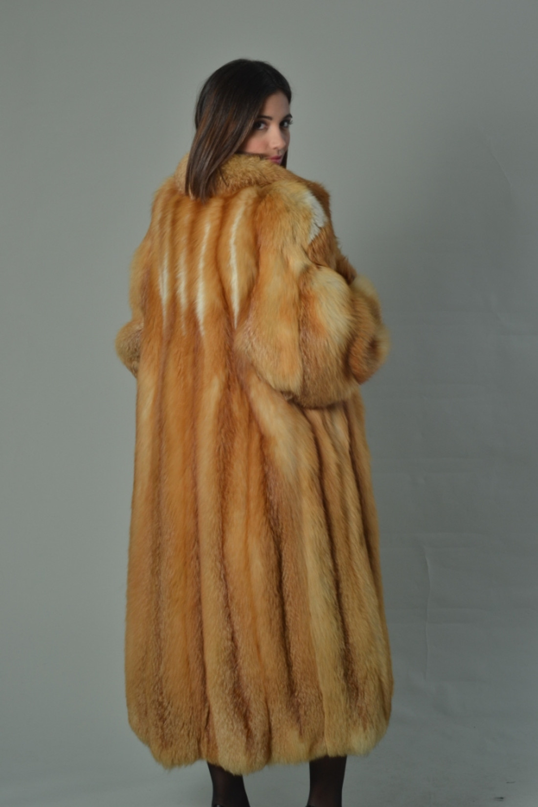 fully let out red fox fur coat rear view saga
