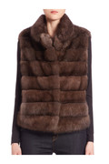 light brown sable fur vest with pelts stiched horizontally on model front view fastened