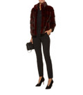 Burgundy Mink fur coat stand up collar  on model wearing black cotton pants , leather bag and leather high heels Burgundy Mink fur coat stand up collar  on model wearing black cotton pants , leather bag and leather high heels