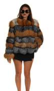 red and silver fox fur coat on model wearing black miniskirt waist length collarless red and silver fox fur coat on model wearing black miniskirt waist length collarless