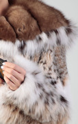 hooded lynx fur coat with sbale fur lining , ending into collar hooded lynx fur coat with sbale fur lining , ending into collar