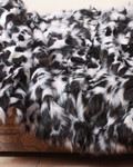 black and white sectional fur blanket close up view black and white sectional fur blanket close up view