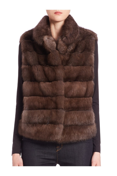  light brown sable fur vest with pelts stiched horizontally on model front view fastened