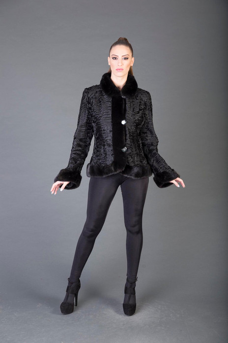Black Persian Lamb Fur Jacket with Mink Trim on model Black Persian Lamb Fur Jacket with Mink Trim on model