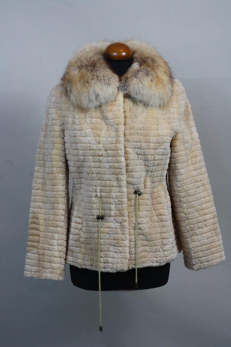cream ssheared and sculpted beaver fur jacket with fox collar and drawstrings on mannequin cream ssheared and sculpted beaver fur jacket with fox collar and drawstrings on mannequin