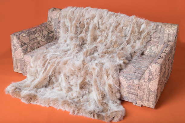 snow top fox fur blanket on couch