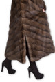 lateral view of full length russian sable fur coat with focus on side slits