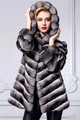 chinchilla fur coat on blonde model with hood on