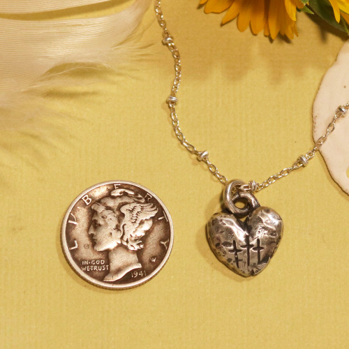 Love is Sacrifice Necklace Love is Sacrifice Necklace