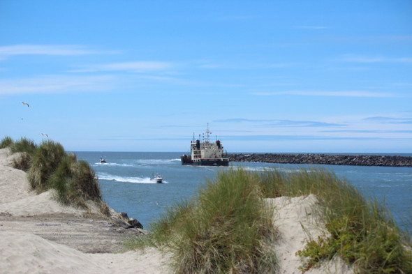 Ship Entering Newport, Oregon by Craig Fentiman