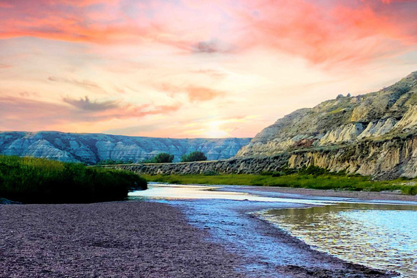 Sunset Over Rugged Badlands by Josh Blackman