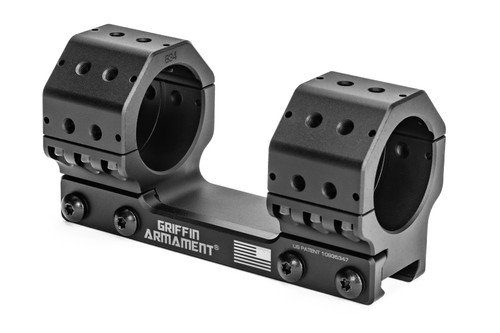 The Griffin Precision Mount (GPM™) Afford unmatched attachment versatility for accessories, backup optics, offset sites, or bubble levels by way of the Accessory Interface Suite (AIS™) with dowel pin alignment system. This is an image of a black Standard, unibody box scope mount Made in America from 6061-T6 aluminum. 