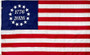 Betsy Ross circle of stars with the dates 1776/2026 printed in the center of the circle; red and white stripes consistent with US flag.