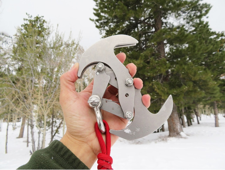 Person holding Gravity Hook 3.0 showing large size and grip-friendly body design.