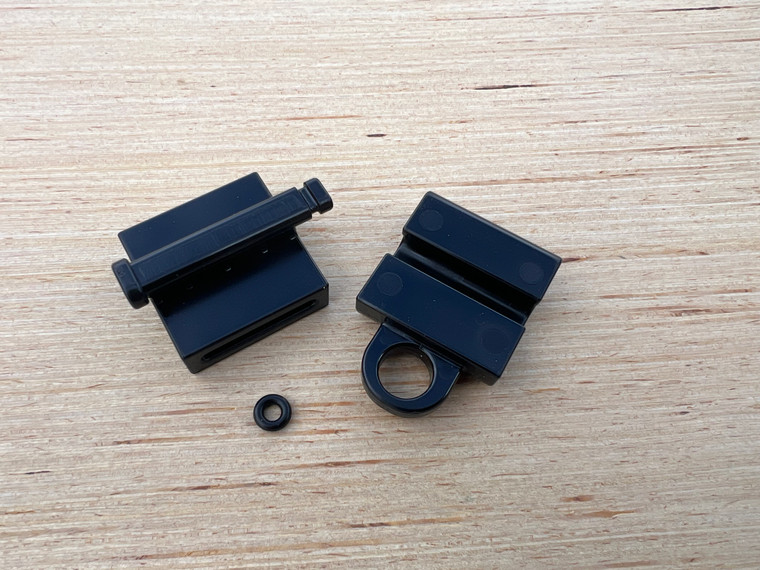 Pack Point pieces separated and laid out on a wooden background.