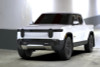 Rally Armor 22-25 Rivian R1T Black UR Mud Flap w/Tangerine Scream Logo