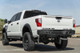 Addictive Desert Designs 16-18 Nissan Titan XD Stealth Fighter Rear Bumper w/ Backup Sensor Cutout