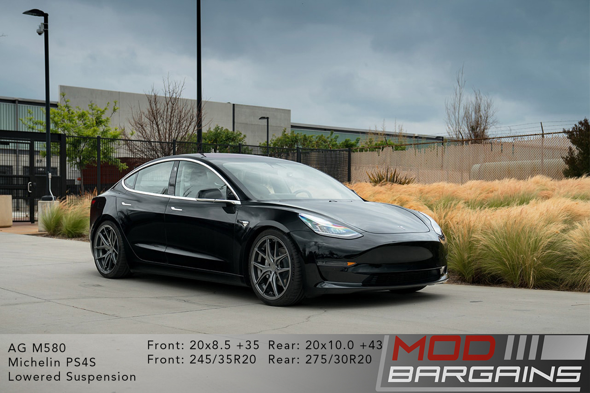 Black Tesla Model 3 on Gunmetal Avant Garde AG Wheels M580 20x8.5 front and 20x10 rear with Michelin PS4S Tires and lowered suspension