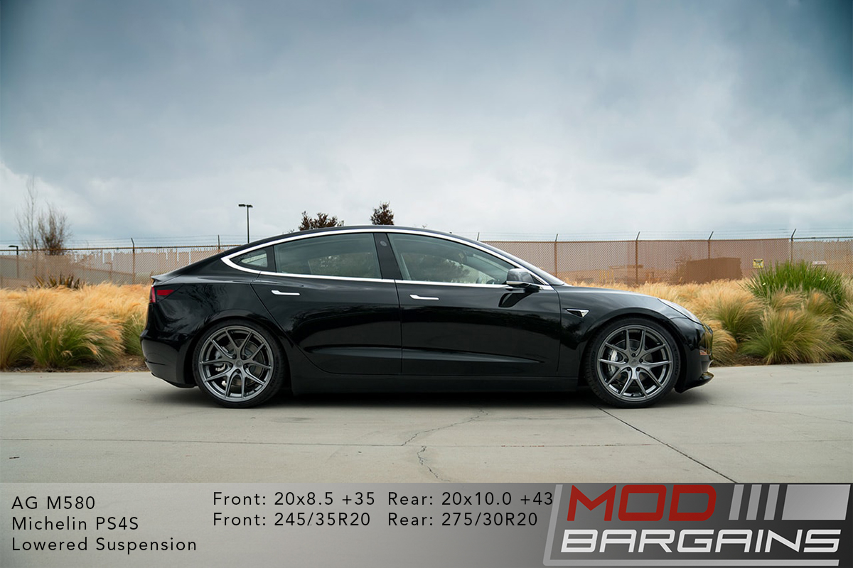 Black Tesla Model 3 on Gunmetal Avant Garde AG Wheels M580 20x8.5 front and 20x10 rear with Michelin PS4S Tires and lowered suspension