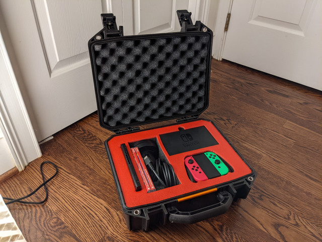 TCF-V200-275038 Nintendo Switch in a Pelican Vault Case TCF-V200-275038 Nintendo Switch in a Pelican Vault Case