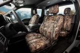 Realtree Waterproof Camo Seat Covers installed on front seats, waterproof camo for durable everyday protection.