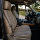 Saddle Blanket seat covers on front buckets, multicolor woven inserts with tan stripes and matching tan bolster trim.