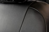Close-up of Pro-Tect Vinyl Seat Covers showing the heavy-duty water-resistant vinyl texture and durable stitching.