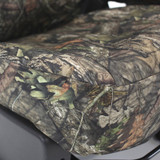 Close-up of Mossy Oak Waterproof Camo Seat Covers seat cushion showing waterproof camo fabric texture and stitching.