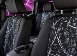 Moon Shine Waterproof Camo Seat Covers (Sport w/ Black Trim) installed on seats, camo inserts with black side panels.