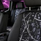Moon Shine Waterproof Camo Seat Covers (Sport w/ Black Trim) front seat view, custom-fit camo pattern with black trim.
