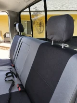 Atomic Pro-Tect seat covers on truck rear bench, gray center with black bolsters and three headrest wraps.