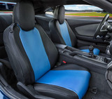 Carbon Fiber Seat Covers installed on front seats in a sports car, black seats with blue carbon-fiber-look center panels.