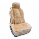 Tan Sheepskin Universal Seat Cover installed on a front bucket seat, offering plush luxury and durable protection.