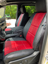 Exotic Seat Covers installed on front seats, featuring a bold red and black crocodile skin texture for a custom-fit luxury look.