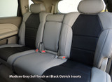 Exotic Seat Covers installed on front seats, featuring a bold red and black crocodile skin texture for a custom-fit luxury look.