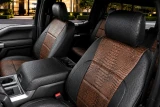 Exotic Seat Covers installed on front seats, featuring a brown crocodile skin texture with black ostrich accents for a premium look.