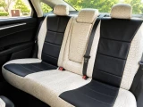 Exotic Seat Covers (Bone Croc w/ Perforated Sof-Touch Black Inserts) on rear seat with premium crocodile texture.
