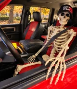Exotic car seat covers in Midnight Croc with Flame Croc on truck front seats, black bolsters and red center inserts.