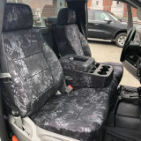 Luxury Line Kryptek camo seat covers on 40/20/40 bench with console, Typhon grey-black on seats, headrests, and cupholders.