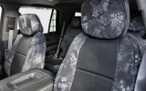 Luxury Line Kryptek Camo Seat Covers installed on front seats, Kryptek Typhon Camo with  Black Ostrich Insert panels.