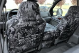 Luxury Line Kryptek camo seat covers on 40/20/40 front seats with console, Typhon grey-black pattern and rear map pockets.