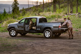 Luxury Line Realtree Camo Seat Covers on a pickup truck, camo seat protection for hunting and outdoor use.