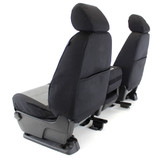 Rear view of front seats with black waterproof Cordura covers featuring convenient storage map pockets.