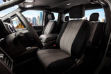 NeoSupreme Seat Covers installed on front seats in a truck, premium two-tone black and gray with a custom fit.