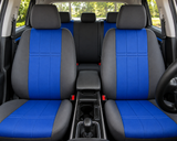 NeoSupreme seat covers on front buckets and rear bench, royal blue centers with charcoal bolsters and headrests.
