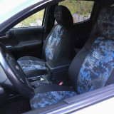 Custom-fit Kryptek® Camo seat covers in a striking blue "Pontus" pattern installed on front bucket seats, offering a bold tactical look for vehicle interiors.